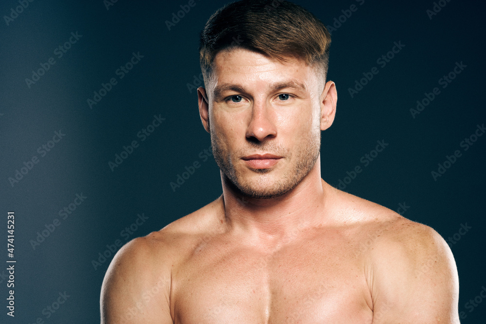 athletic male topless workout muscle bodybuilder dark background athletic male topless workout muscle bodybuilder dark background
