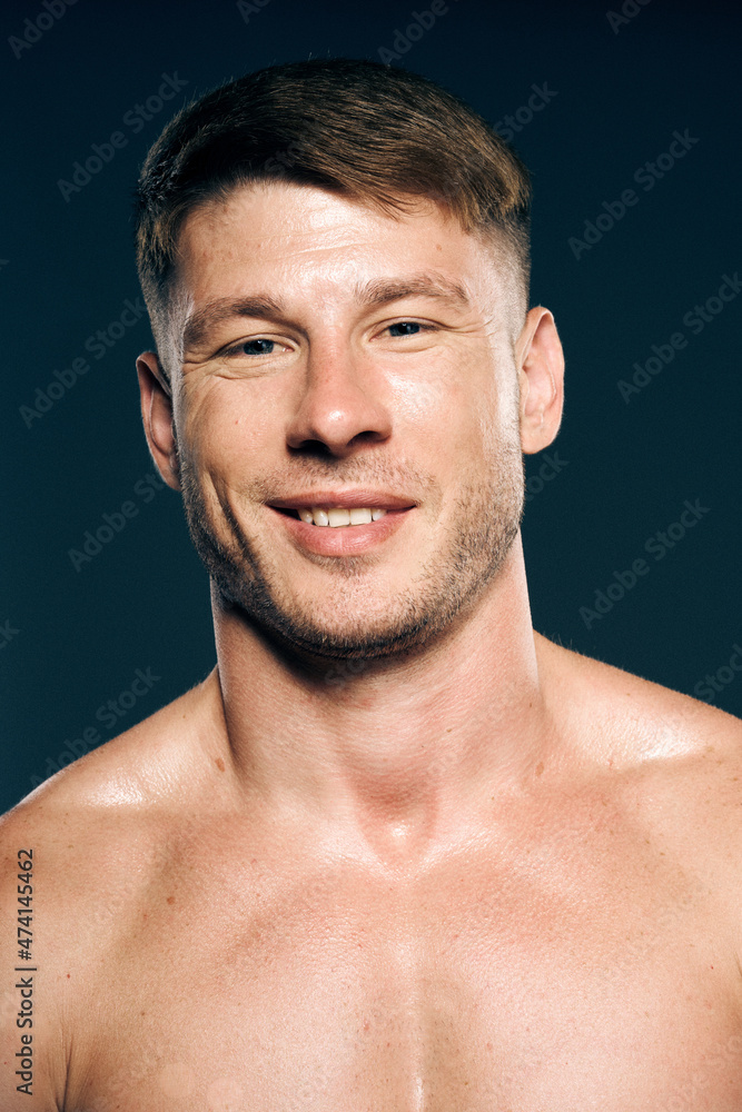 Fototapeta premium athletic male topless workout muscle bodybuilder dark background