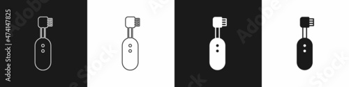 Set Electric toothbrush icon isolated on black and white background. Vector