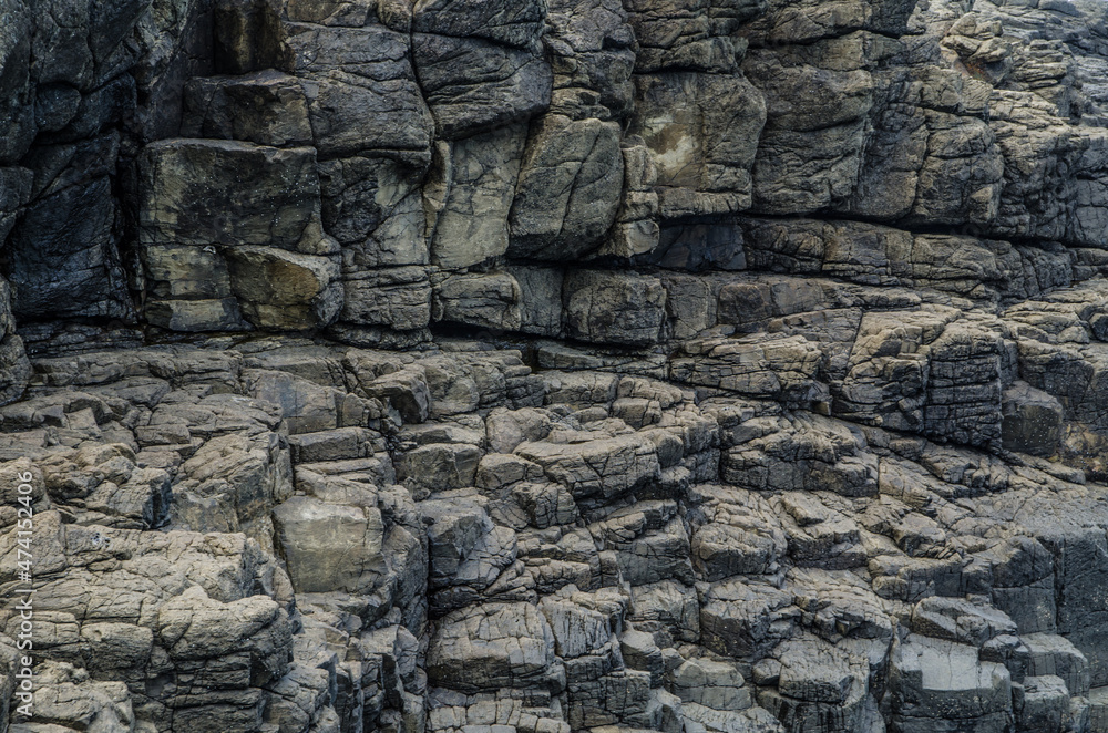 Grey coastal rock wall pattern. Grey coastal rock wall pattern.