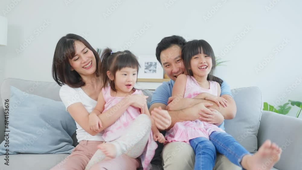 Portrait of Asian happy family spend time with kid together in house. Portrait of Asian happy family spend time with kid together in house.