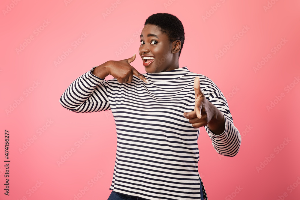 Black Lady Pointing Finger At Herself And Camera, Pink Background Black Lady Pointing Finger At Herself And Camera, Pink Background