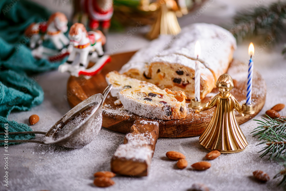Christmas curd stollen on a Christmas rustic background