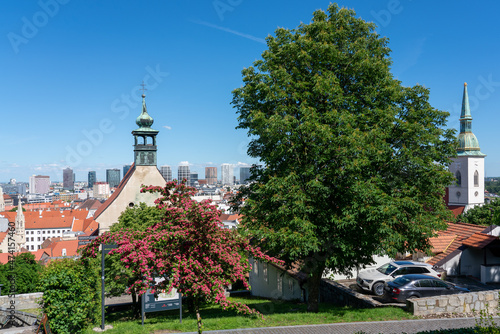 Bratislava panorama with cathedral and modern high-rises on horizon