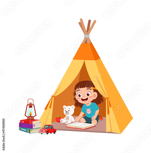 cute little girl play inside small tent