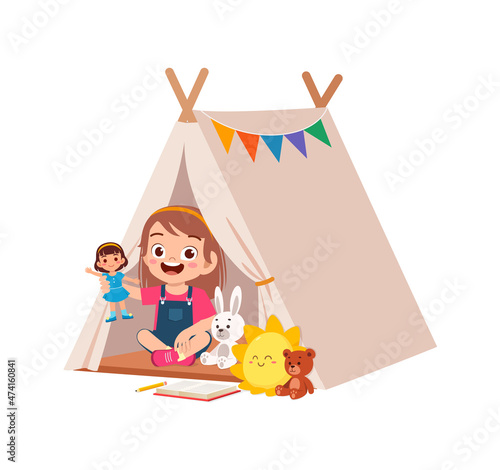 cute little girl play inside small tent
