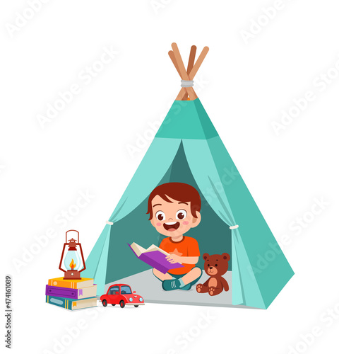 cute little boy play inside small tent