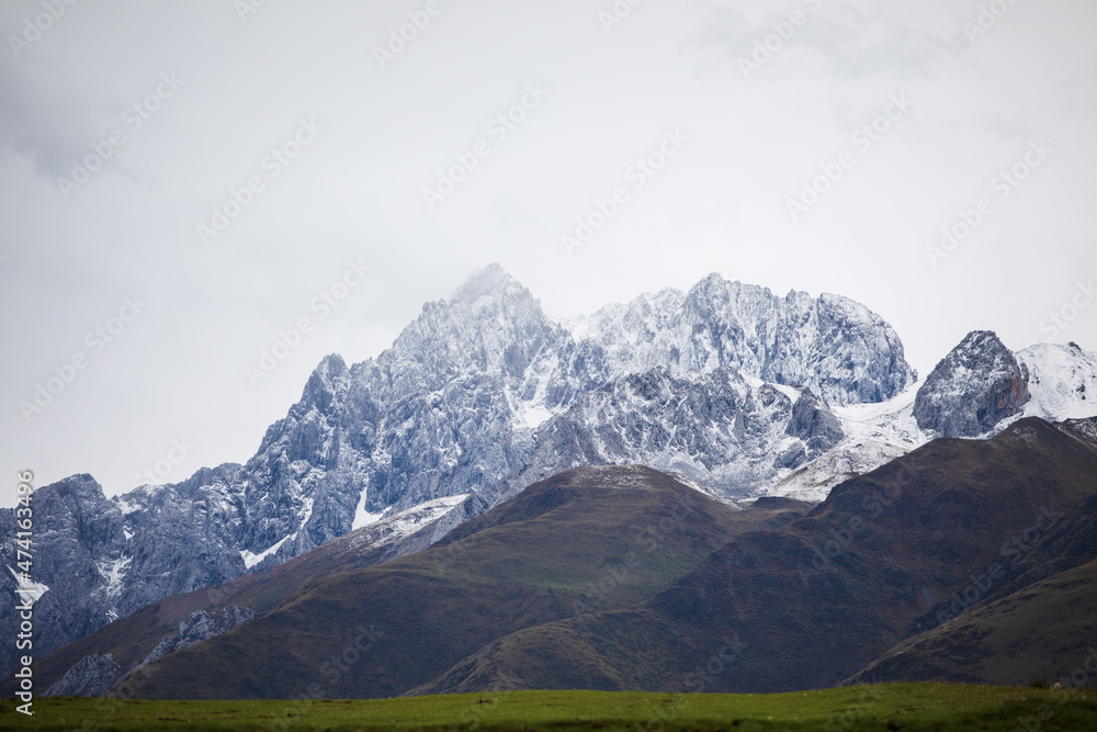 Rocky mountains with snow on top on Tibetan Plateau in China