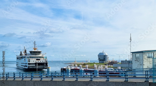 Ferry servicing between Den Helder city and Texel Island in The Netherlands photo