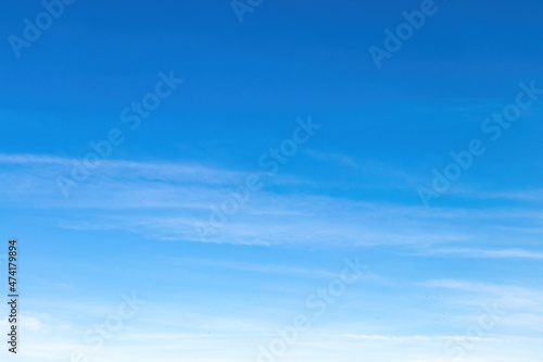 Blue sky with soft clouds for background