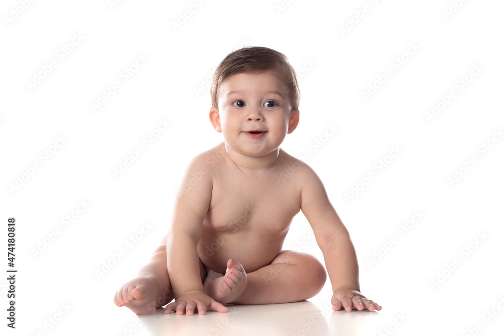 Cute baby in diaper looking at the camera Cute baby in diaper looking at the camera