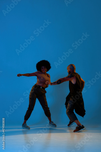 Flexible dance couple dancing hip hop dance