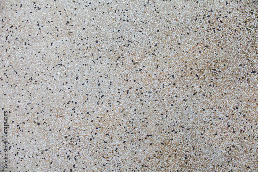 Cement mixed small gravel stone wall or floor texture background,The Dust Texture. Abstract dense splash texture. Random pebble gravel oval elements seamless pattern. Cement mixed small gravel stone wall or floor texture background,The Dust Texture. Abstract dense splash texture. Random pebble gravel oval elements seamless pattern.