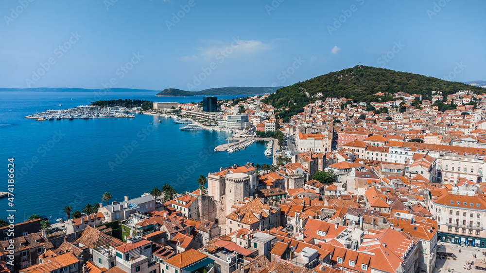 Drone shot Croatian city of Split in the resort region of Dalmatia. Hill with paths and city views Main attraction. View from a drone on a pier in the city of Split Croatia.