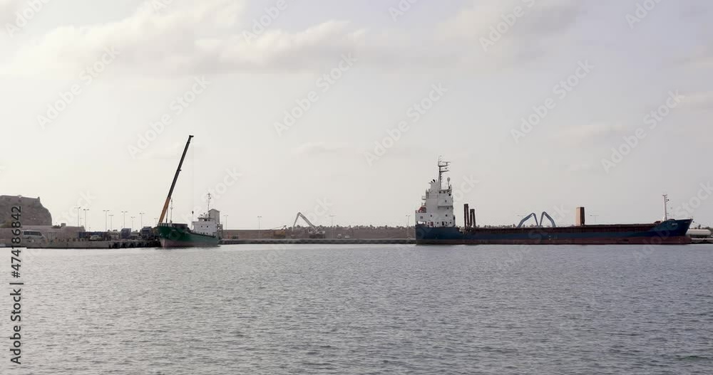Chania Port Terminal - Tank boats or ferries are loading containers at Chania Marina In Greece. Chania Port Terminal - Tank boats or ferries are loading containers at Chania Marina In Greece.