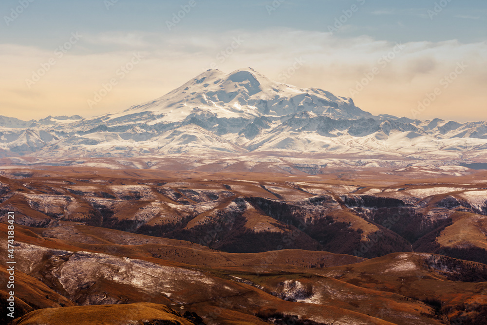 Snow covered Elbrus in autumn. the Bermamyt Plateau. Russia.