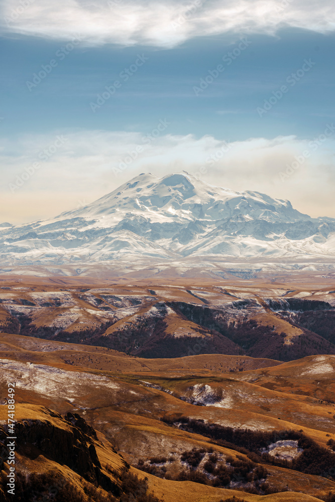 Snow covered Elbrus in autumn. the Bermamyt Plateau. Russia.
