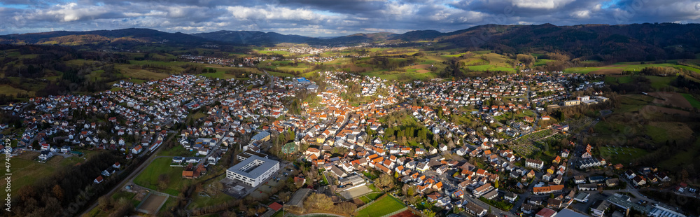 Aerial view around the city Rimbach in Germany. On a cloudy day in Autumn. 