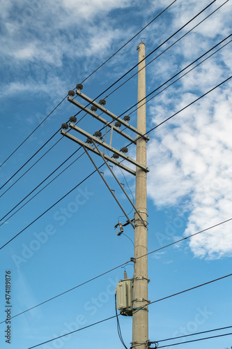 Wallpaper Mural Electric pole and electric transformer with a clear blue sky background in portrait format Torontodigital.ca
