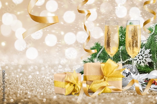 New Years Eve Celebration with Champagne and Confetti on the desk