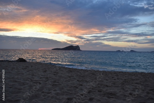 
A sunset, the sea, a beach and the sky in Ibiza