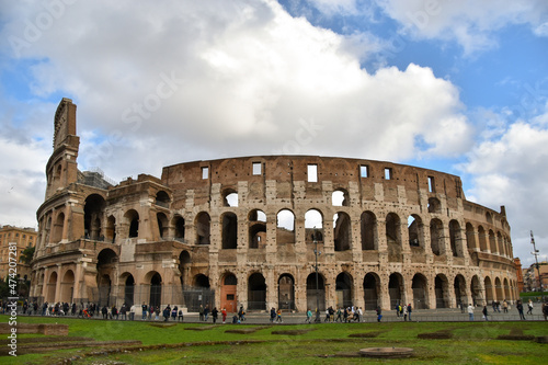 Colosseum in Rome, Italy on a sunny day, walking on ancient step-ways of the Roman Empire