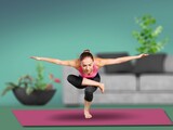 young flexible girl does yoga and gymnastics, yoga and fitness concept