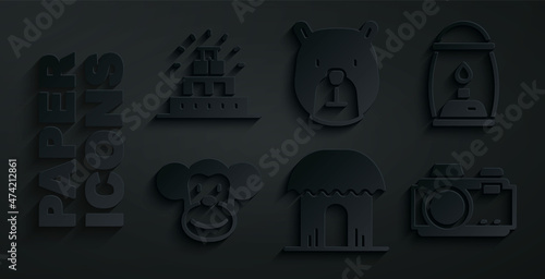 Set African hut, Camping lantern, Monkey, Photo camera, Bear head and Chichen Itza Mayan icon. Vector
