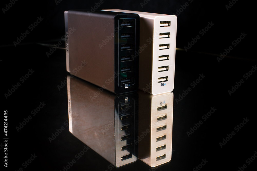 Reflection of USB banks sitting on a desk in the dark Reflection of USB banks sitting on a desk in the dark