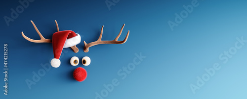 Reindeer with red nose and Santa hat on blue Christmas background 3D Rendering, 3D Illustration