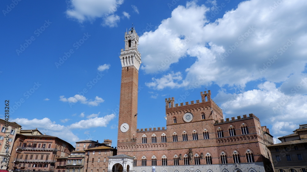 Panorama of Piazza del Campo (Campo square), Palazzo Publico and Torre del Mangia (Mangia tower) in Siena, Tuscany, Italy 