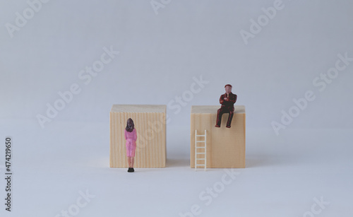 Gender gap. The man went up the stairs, the woman has no stairs. Concepts of gender inequality in social and economic activity