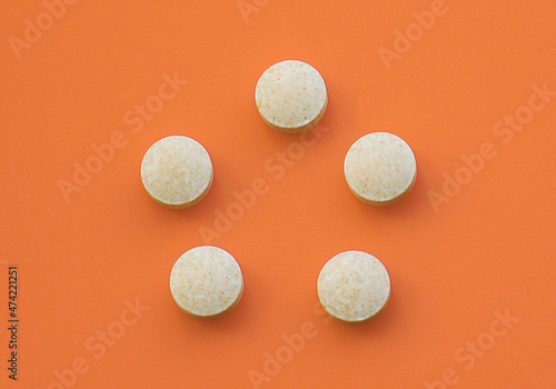 round convex tablets vitamins for maintaining health
