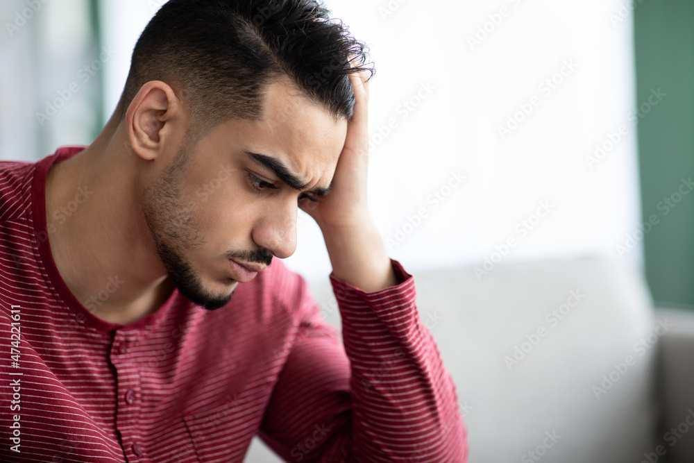 Closeup portrait of upset arab guy having difficulties