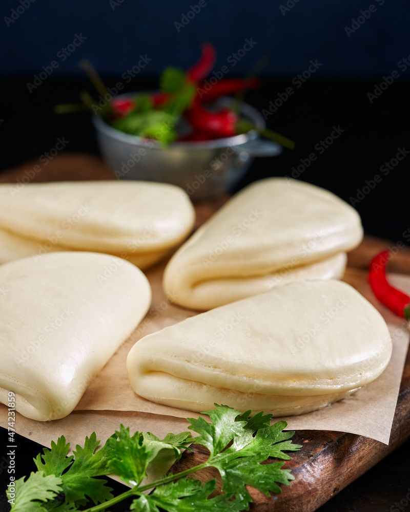 Gua bao, Close up of Taiwanese-Style steamed buns, bao buns. Gua bao, Close up of Taiwanese-Style steamed buns, bao buns.