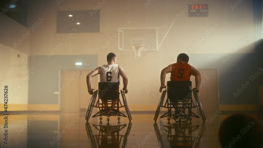 Court for Wheelchair Basketball Game of One on One. Competing Friends Ready to Play do Fist Bump Before Game. Two Professional Players Determined to Win Match. Inspiration of People with Disability Court for Wheelchair Basketball Game of One on One. Competing Friends Ready to Play do Fist Bump Before Game. Two Professional Players Determined to Win Match. Inspiration of People with Disability
