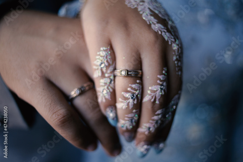 Bride henna carved beautiful and unique at bride's hand	
