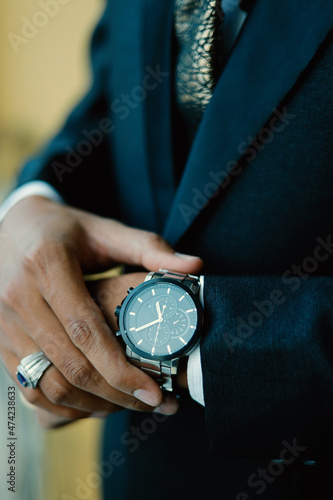 Man's watch on hand. Wedding ceremony 