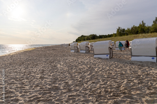 The view of the beach of Zempin on the island of Usedom with many beach chairs photo