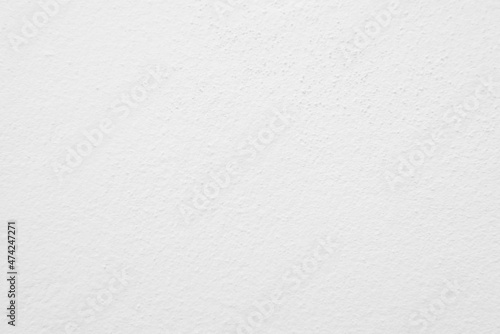 Seamless texture of white cement wall a rough surface, with space for text, for a background..