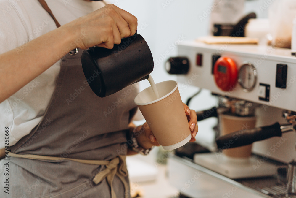 Barista Pouring Cream Into Coffee Barista Pouring Cream Into Coffee