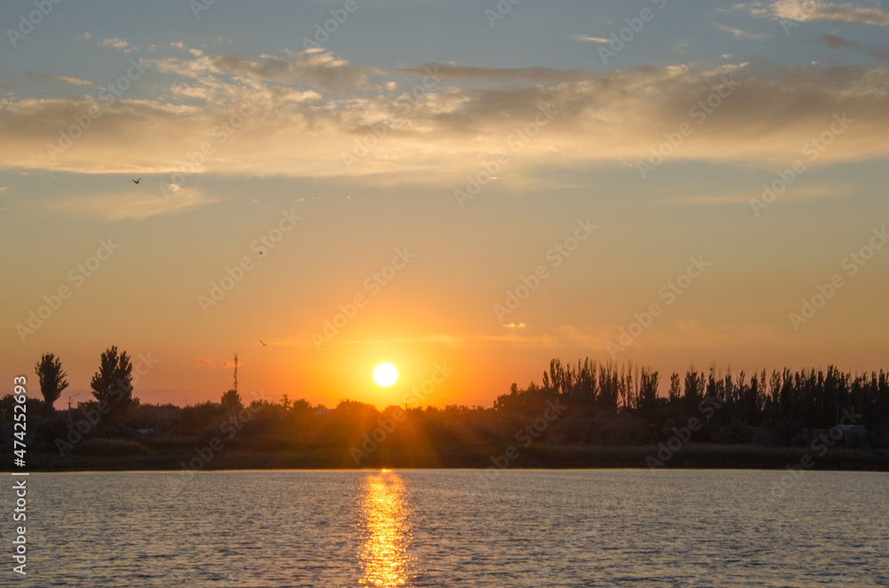 sunset over the river sunset over the river