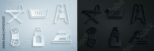 Set Bottle for cleaning agent, Clothes pin, Yarn, Electric iron, Temperature wash and Iron and ironing board icon. Vector
