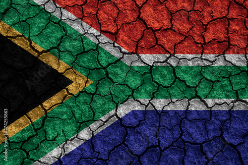 South Africa flag painted on a cracked ground 