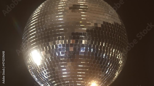 Spinning disco ball with stars and sparkles