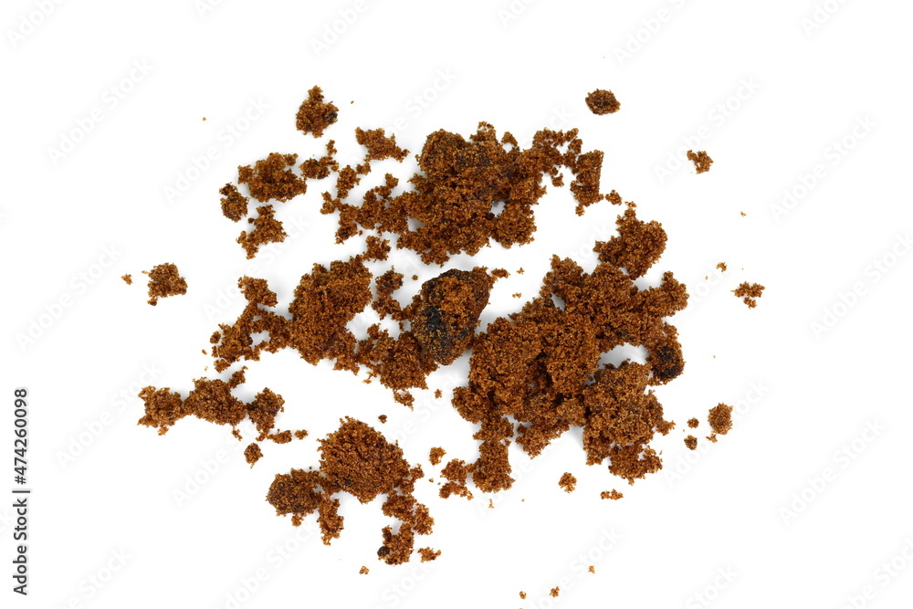Raw Cane Sugar isolated o white background. Pile of dark brown soft sugar, isolated . Natural dark muscovado.