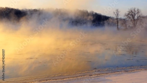 River water steaming in extreme cold -20F, this is the Fox River in Kaukauna, Wisconsin.
 photo