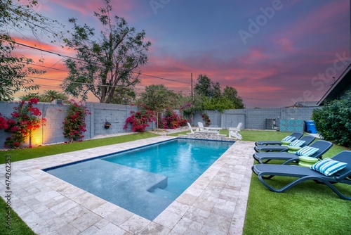 Sunset over a luxury pool  photo