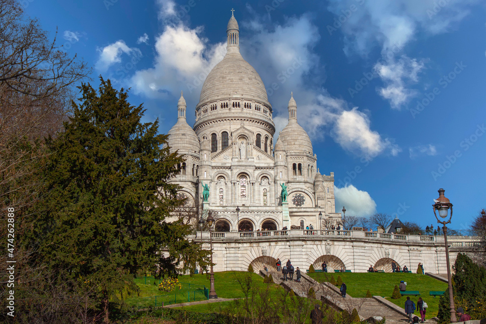 The Basilica of the Sacred Heart (in French , basilique du Sacré-Cœur). Symbol of the Monte Martre district , Paris, France The Basilica of the Sacred Heart (in French , basilique du Sacré-Cœur). Symbol of the Monte Martre district , Paris, France