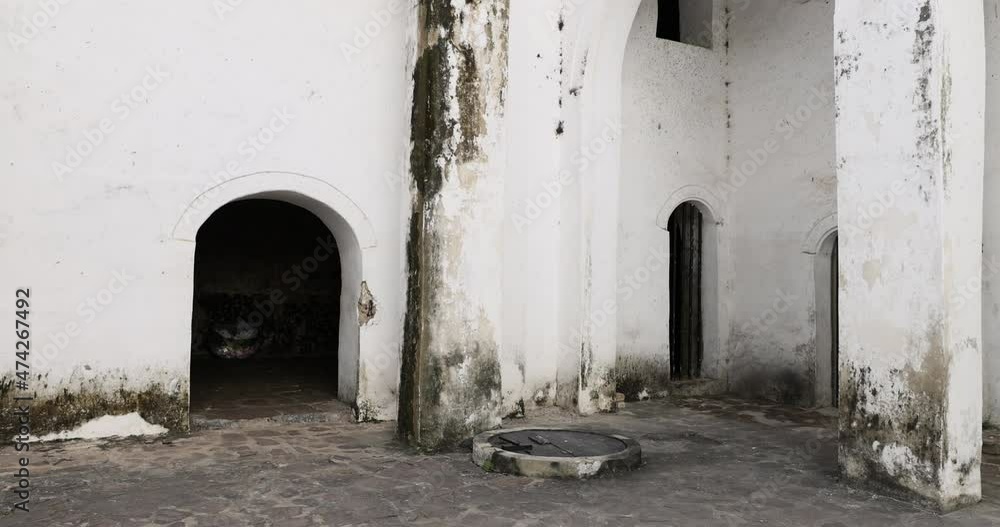 Elmina Castle courtyard church museum Ghana Africa pan. Ghana West Africa on the Atlantic ocean. Erected by the Portuguese in 1482. Slave castle in Africa. Historic slave trade on Gold Coast. Elmina Castle courtyard church museum Ghana Africa pan. Ghana West Africa on the Atlantic ocean. Erected by the Portuguese in 1482. Slave castle in Africa. Historic slave trade on Gold Coast.